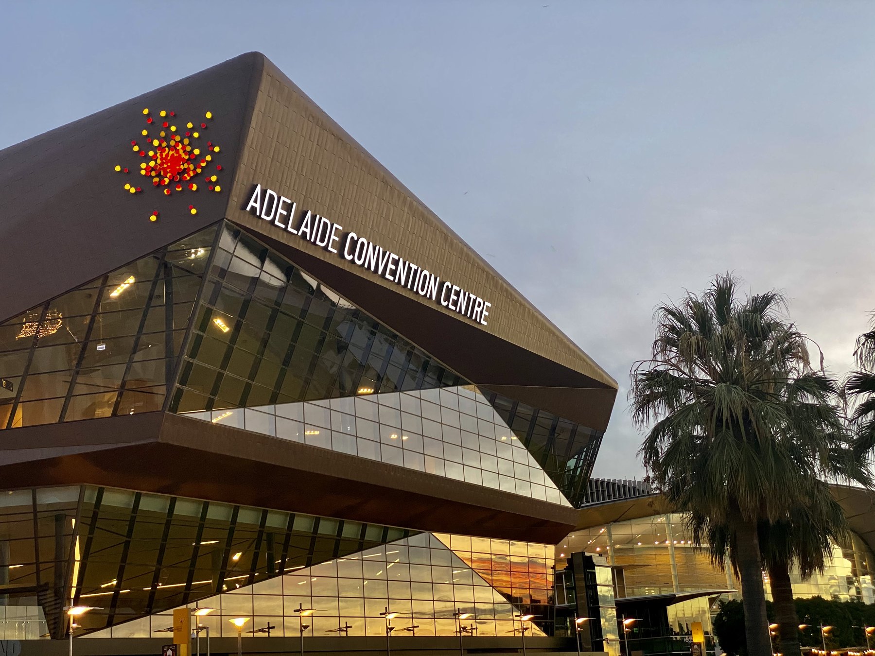 Convention centre entrance for visitor-focused city event travel.